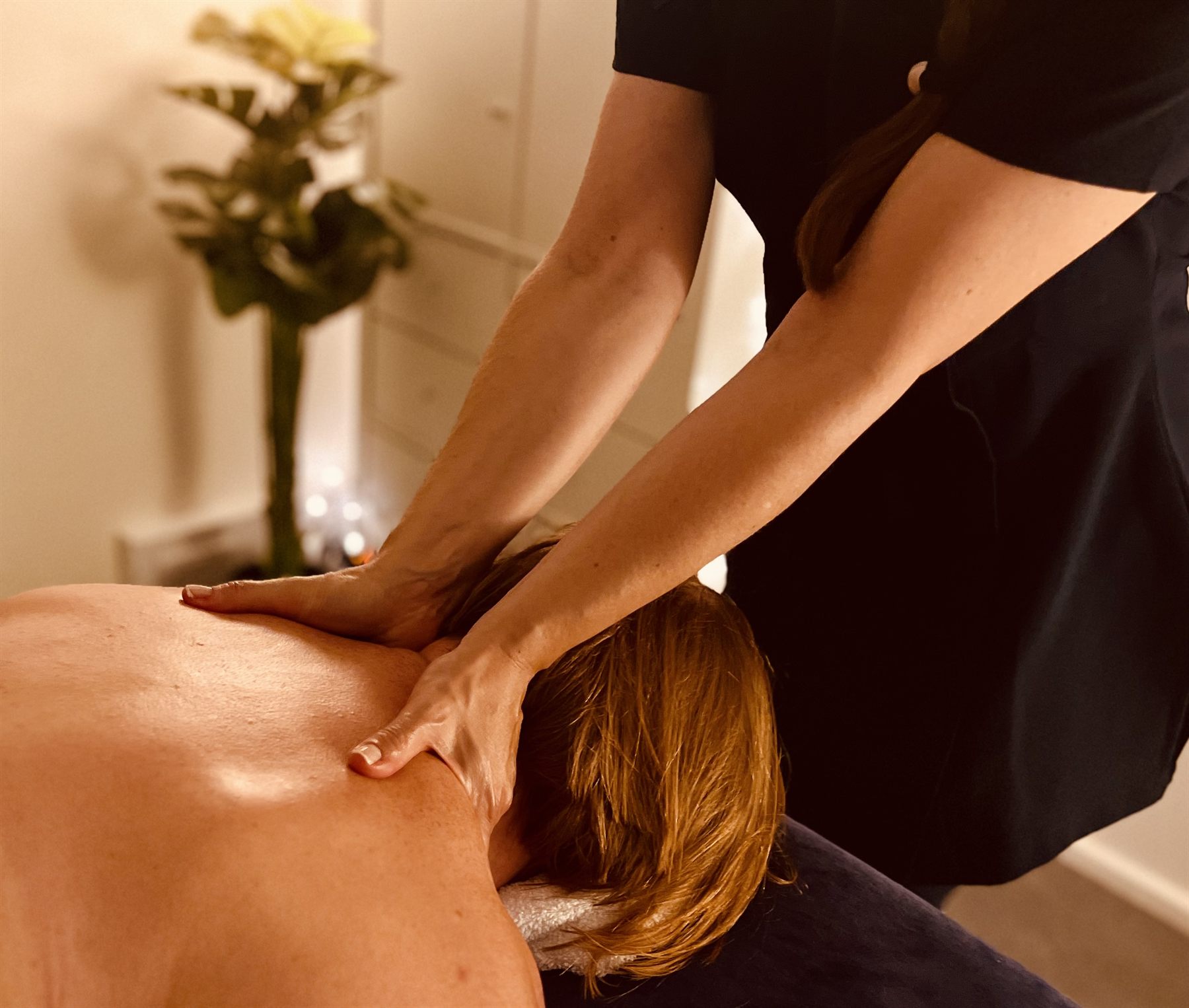 Deep tissue massage worked along the back and shoulder blade